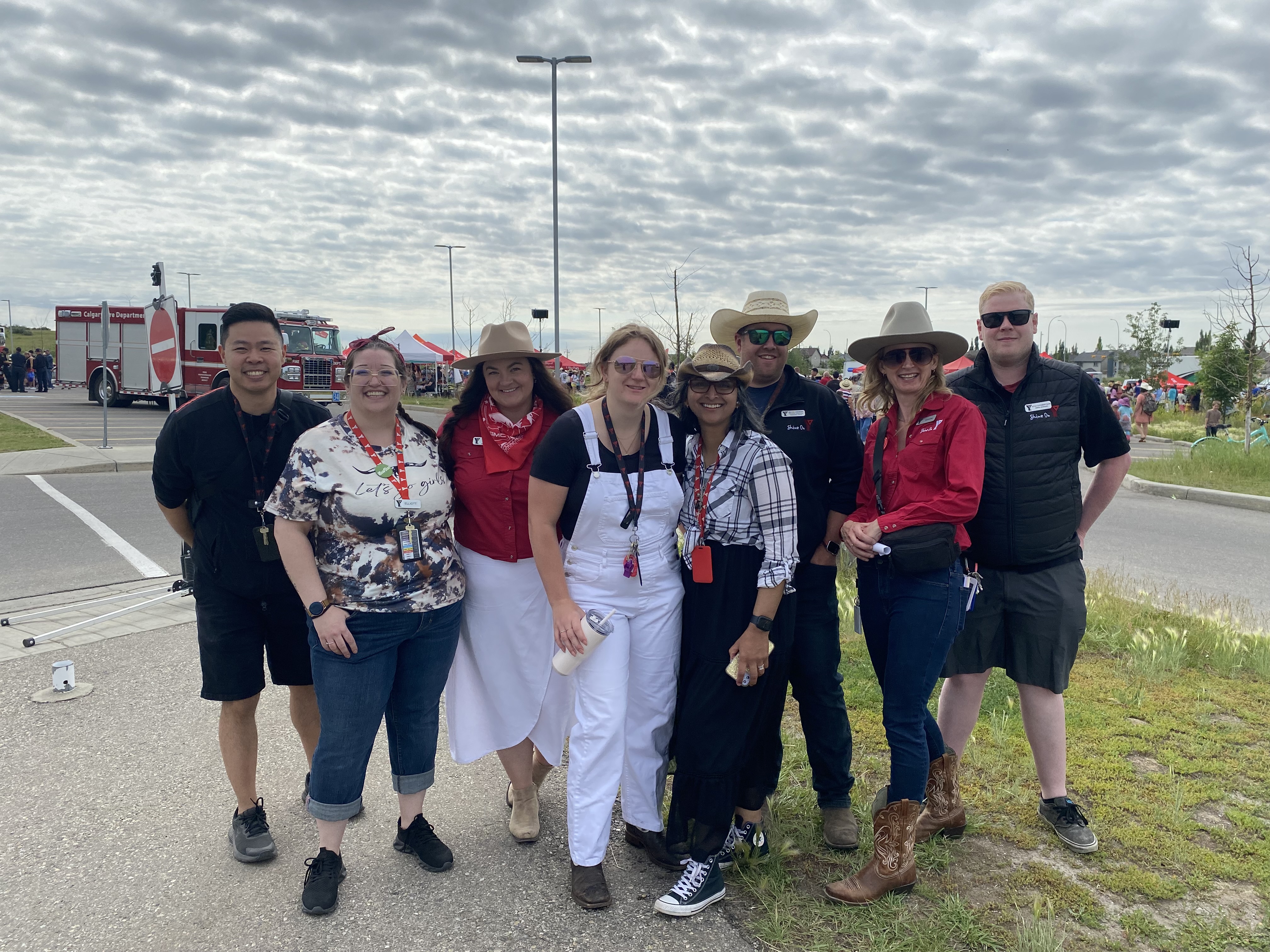 A group of YMCA staff pose at a Stampede Breakfast
