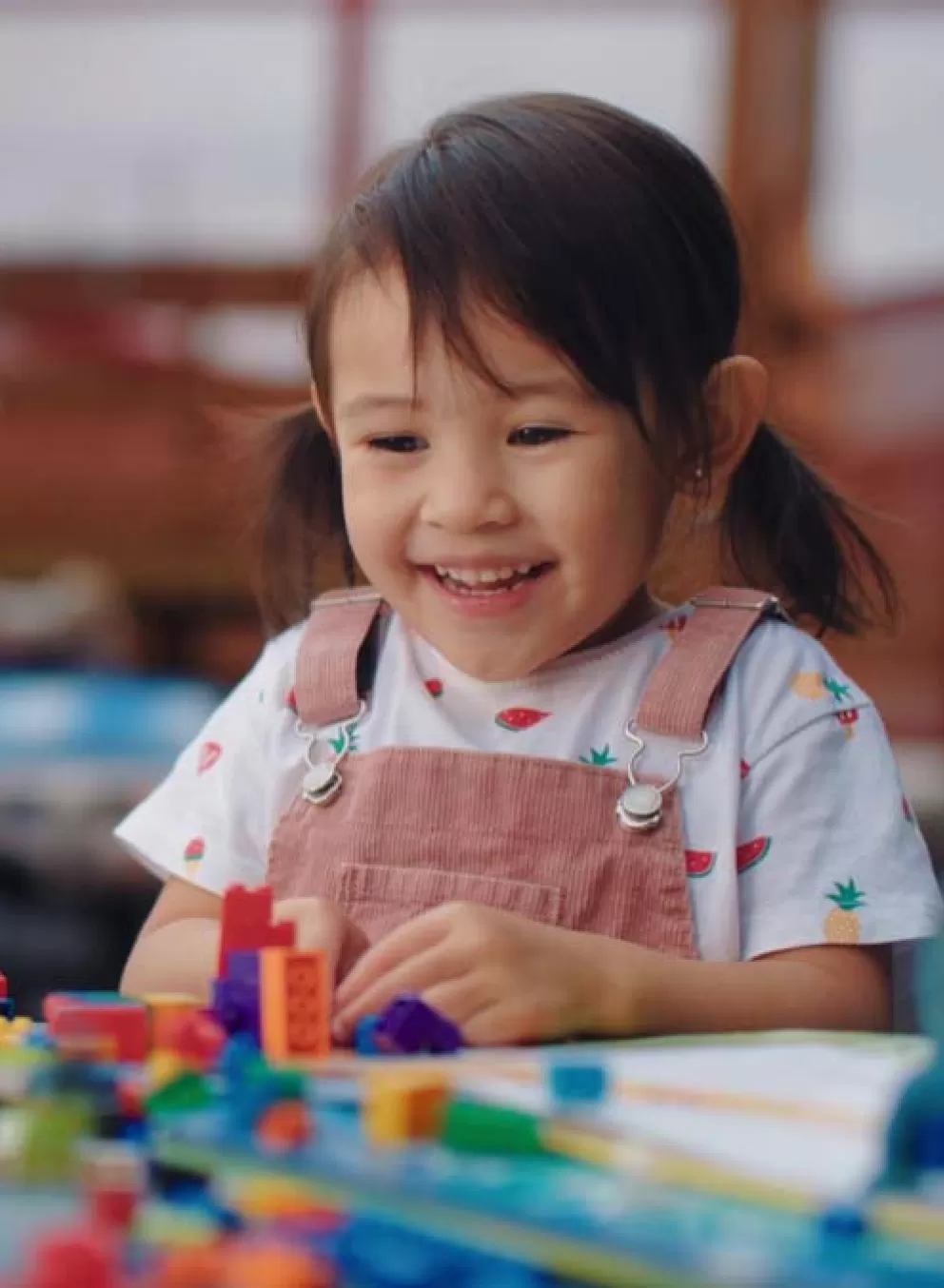 child playing with toys