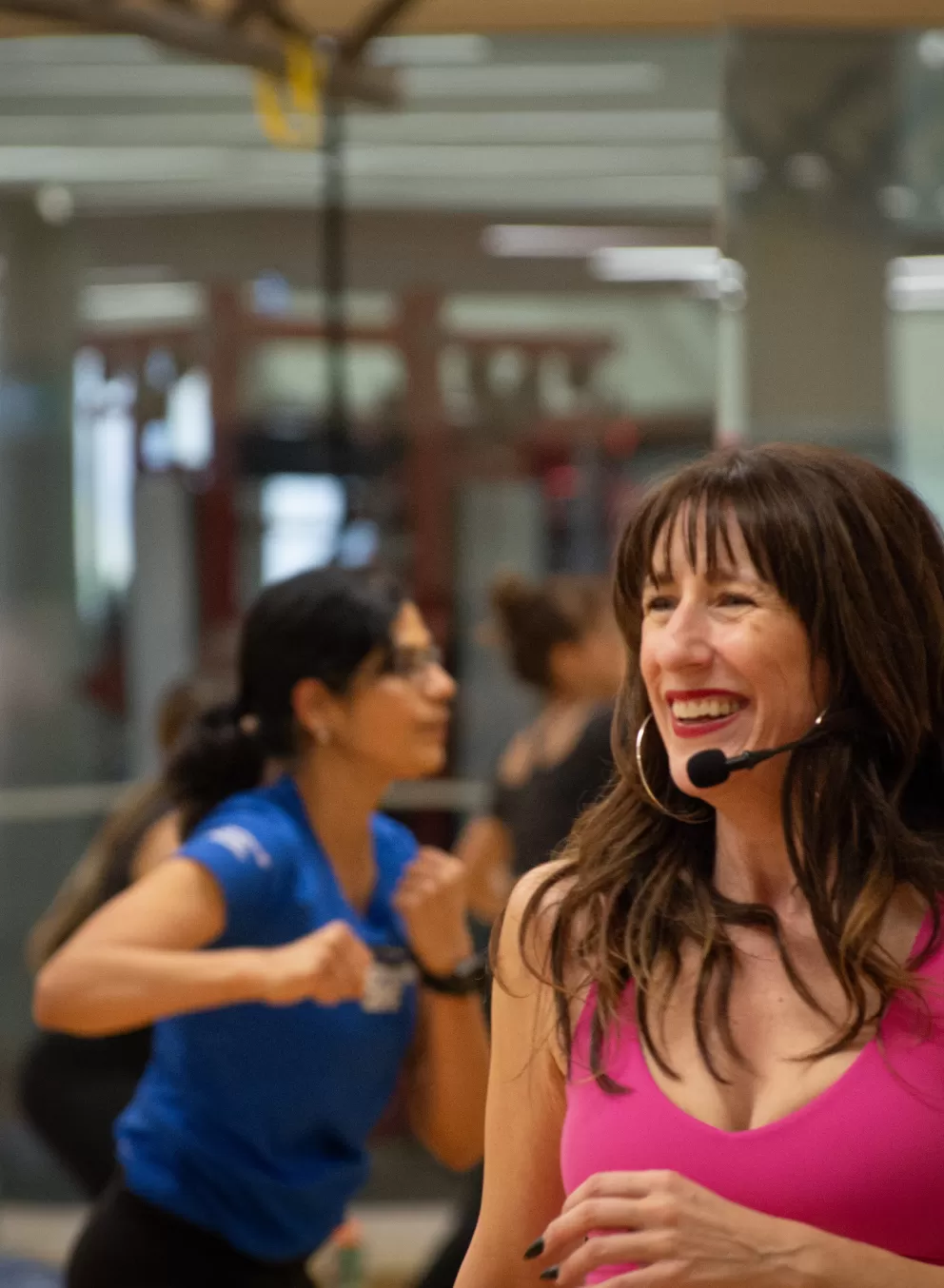 YMCA volunteer teaching a fitness class