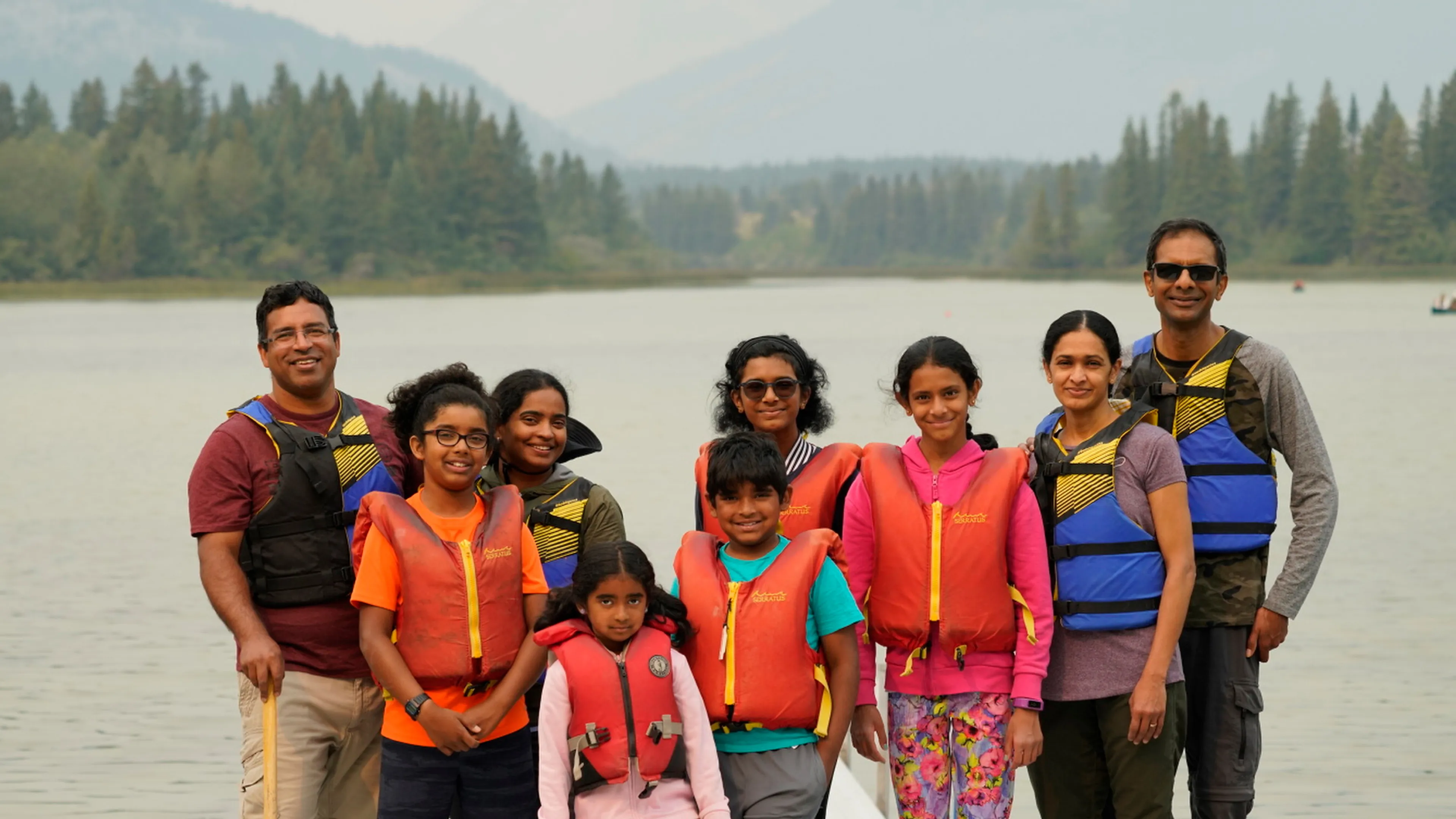 Family on canoe dock
