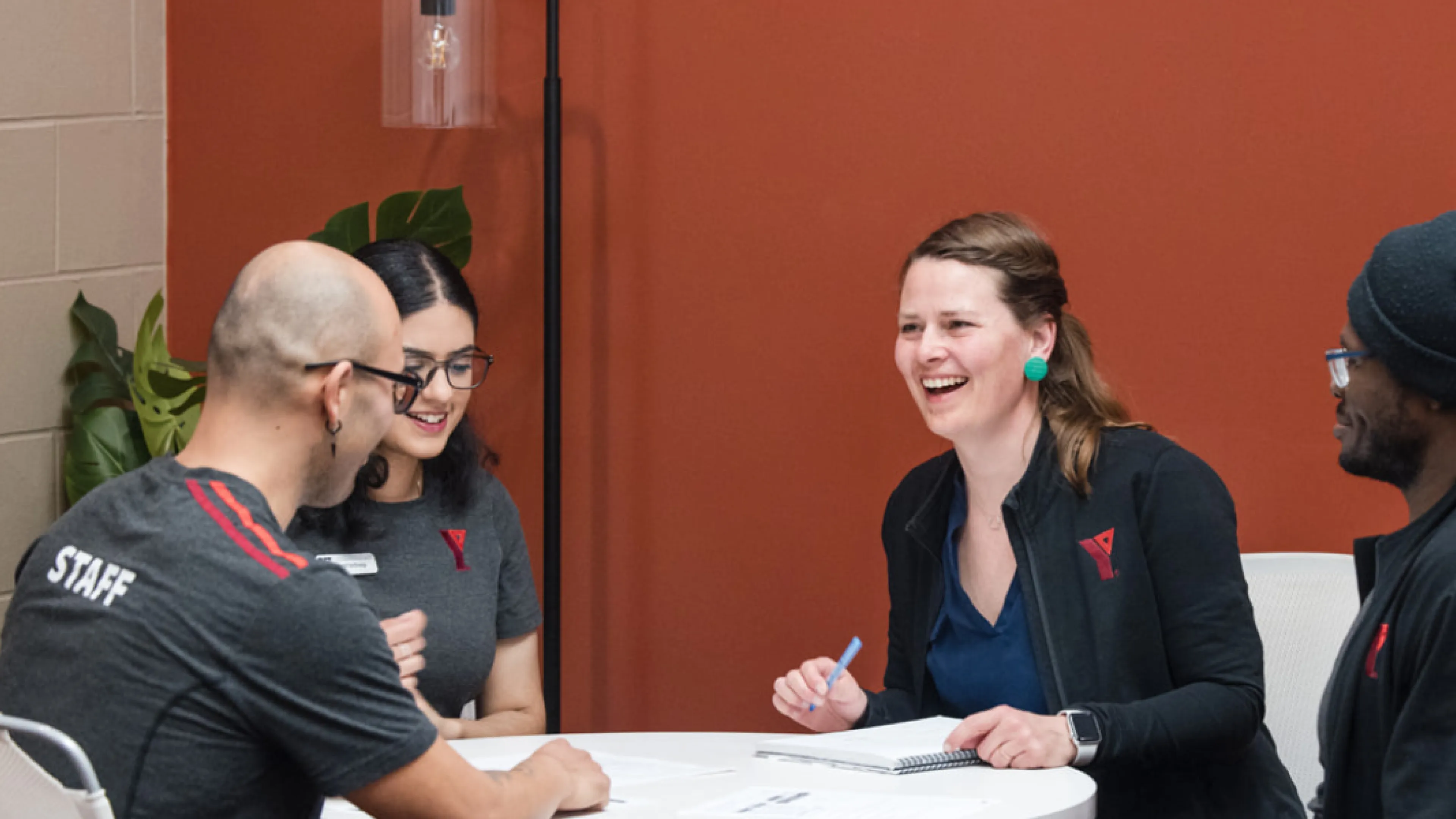 YMCA staff meeting around a table