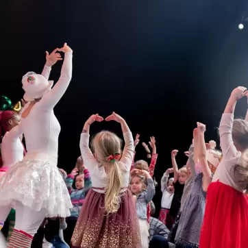 kids dancing on stage during Nutcracker (in a Nutshell) performance
