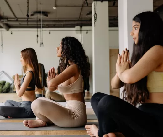 Young women do yoga and meditation