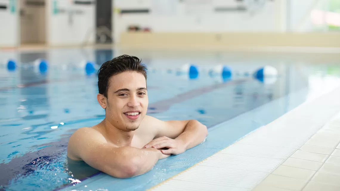young man in the pool