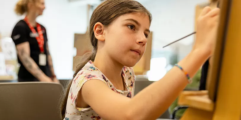 Youth painting at YMCA Calgary at Art Room