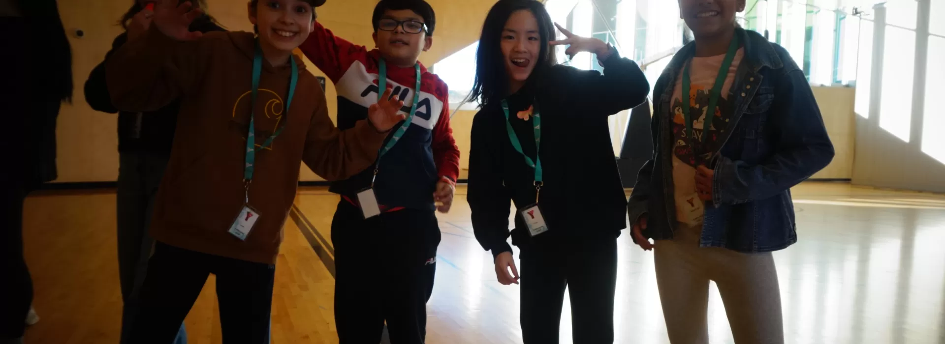 Say cheese! Classmates pose in the gym